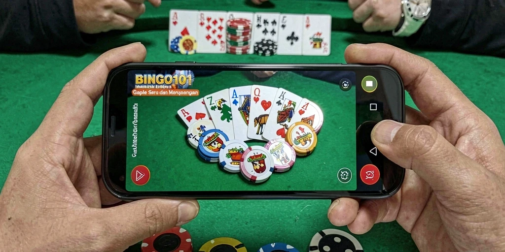 Tampilan gameplay seru dalam BINGO101, menikmati Gaple bersama teman.